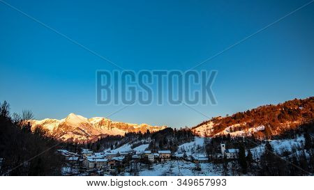 Winter Sunset In The Julian Alps