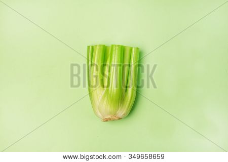 Fresh Bunch Celery On Green Background Top View Horizontal