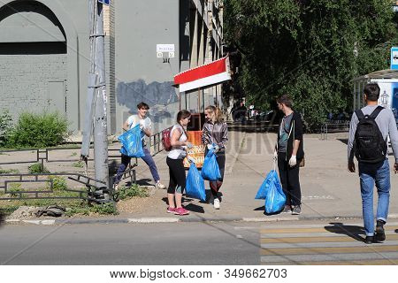 Plogging. Young People Are Happy That They Managed To Collect City Garbage. Saratov, Russia, 10 June