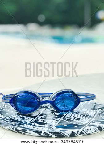 Woodbridge, New Jersey / United States - July 3, 2018: Speedo Goggles And A Sporti Cassette Swim Cap