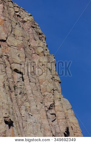 The Spectacular Vertical Rock Columns That Form Devils Tower National Monument In Wyoming Against A 