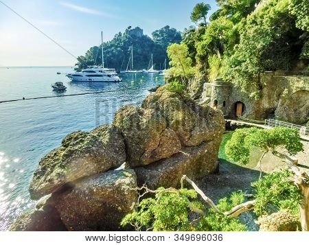 The Small Beach Near Portofino In Genoa On A Blue Sea Background At Italy