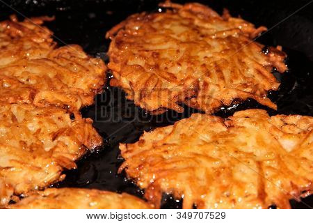 Potato Pancakes In A Pan. Potato Cutlets With Onions