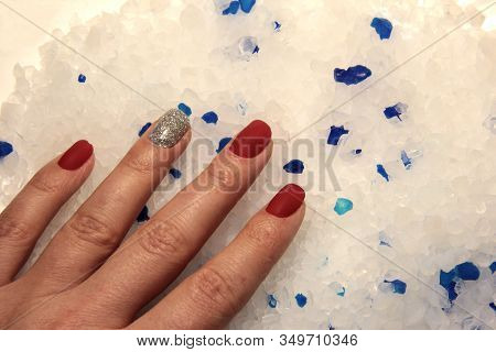 Female Hand In White Crystals