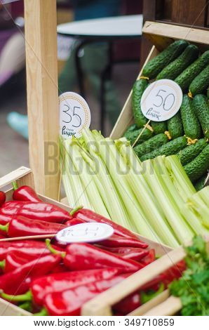 Various Fruits And Vegetables For Sale At Market Stal