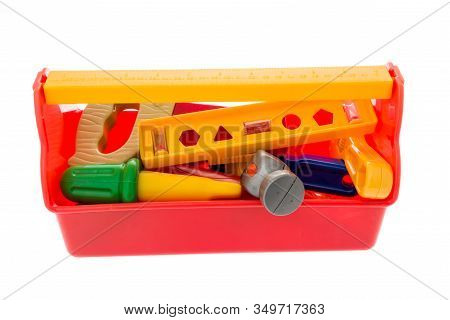 A Mixture Of Toy Tools Including A Tape Measure, Saw, Level, Cresent Wrench, Screw Driver, Drill, Ha
