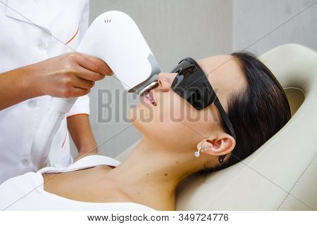 Laser Epilation Of The Nasolabial Triangle Or Electrolysis. Laser Hair Removal Of The Face.