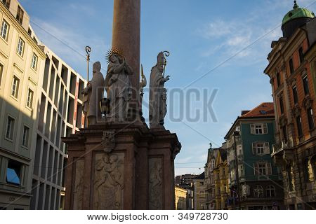 Insbruk, Austria - February 2020:pedestrians, Residents And Tourists In The Narrow Streets Of The Ol