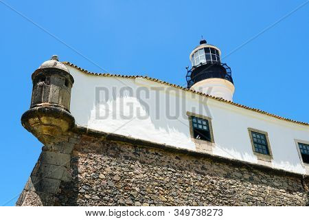 Farol Da Barra, Barra Lighthouse, In Salvador, Bahia, Brazil. The Historic Architecture Of Salvador 