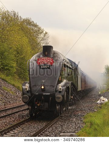 Culgaith, England - May 27:  Preserved Steam Locomotive, Union Of South Africa, Heads The Cumbrian M