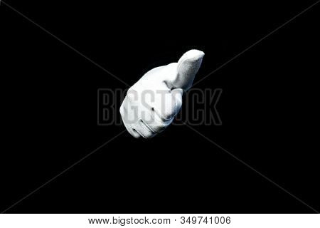 A Hand Wearing White Glove On Black Background Counting Down
