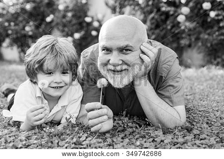 Two Generation - Weekend Together. Two Different Generations Ages: Grandfather And Grandson Together