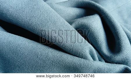 Canvas Fabric. Blue Colour. Velvet With Chiaroscuro. Blue Velvet Fabric Carelessly Folded And Wrinkl