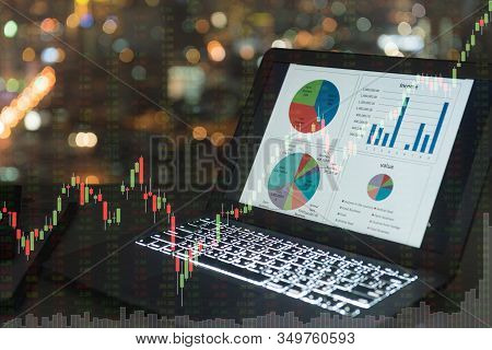 Investment Portfolio On Screen Laptop Computer With Index Stock Market And Chart With Uptrend Stock 