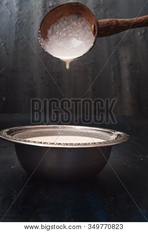 Pancake Batter Being Mixed With A Wooden Ladle, Fermented Rice Pancake Or Dosa Batter, Indian Food, 