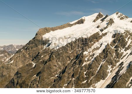 Rock Mountain Slope With Snow On Top, Natural Landscape Background