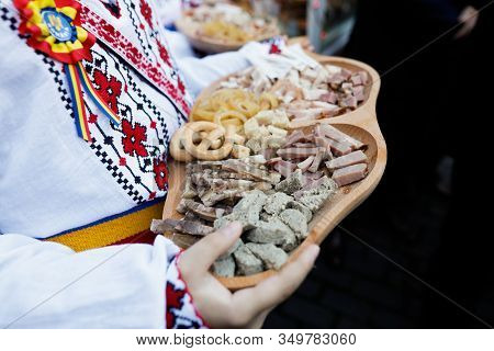 Shallow Depth Of Field (selective Focus) Image With A Boy Dressed In Traditional Romanian Clothes Ho