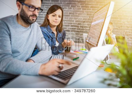 Developing Programming And Coding Technologies. Website Design. Programmer Working In A Software Dev