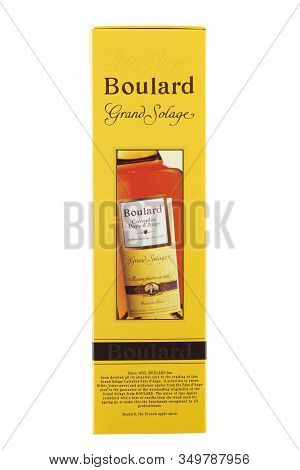 Ukraine, Kiev - December 25. 2019: Bottle Of Boulard Calvados, Grand Solage In Cardboard Box Isolate
