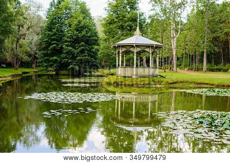 Sightseeing Of Narva. City Park. Beautiful Landscape - A Picturesque Pond With Gazebo, Narva-joesuu,