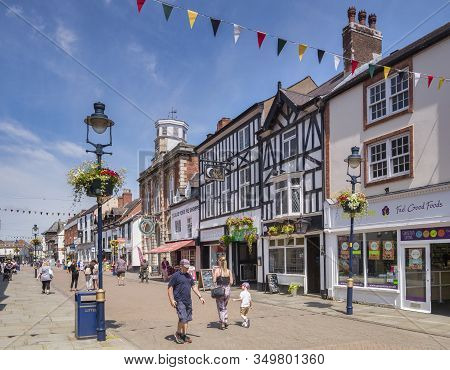 4 July 2019: Melton Mowbray, Leicestershire, Uk - People Shopping In Nottingham Street On A Warm Sum