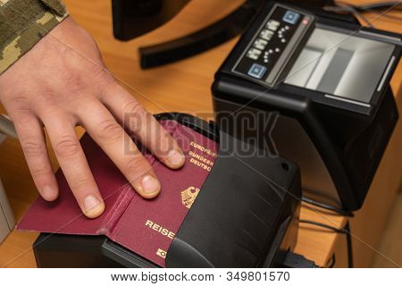 Devices For Scanning Passport Documents, Fingerprinting During Border Control Of Travelers. Automati