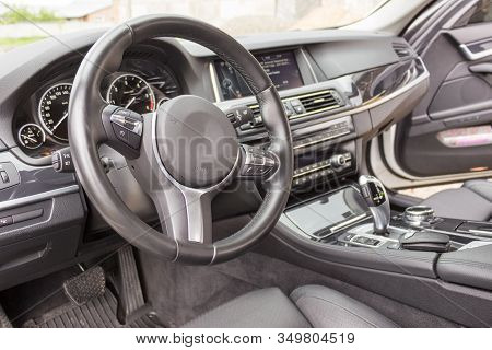 Modern Car Interior, Steering Wheel And Dashboard, Car Navigation, Automatic Transmission Shift Sele