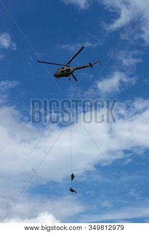 Arlamow, Poland - May, 2019: Evacuation Of Two Servicemen By Air And Takeoff Of Military Helicopter 