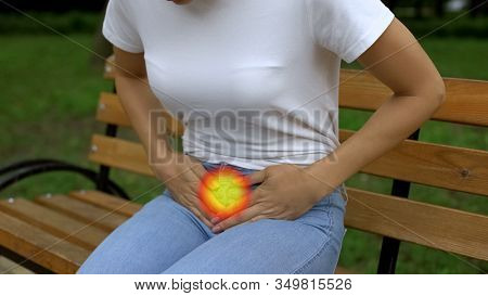 Close Up Of Woman Suffering From Period Pain, Miscarriage, Gynecological Problem