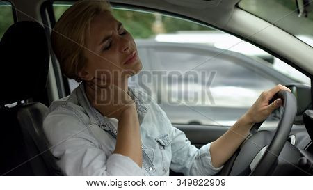 Lady Sitting In Car Feeling Neck Pain, Sedentary Life, Lack Of Physical Activity