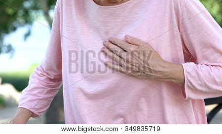 Senior Woman Suffering Heartache, Painful Cramps, Cardiology And Telemedicine