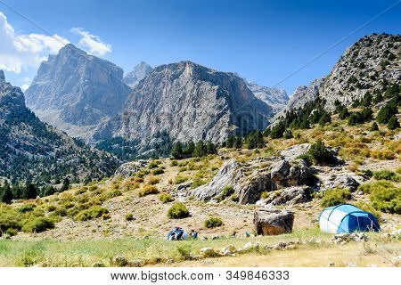 Turkey, Chamard - August 3, 2019: Mountain Landscape With Trees, Tents And Tourists In The Turkish N