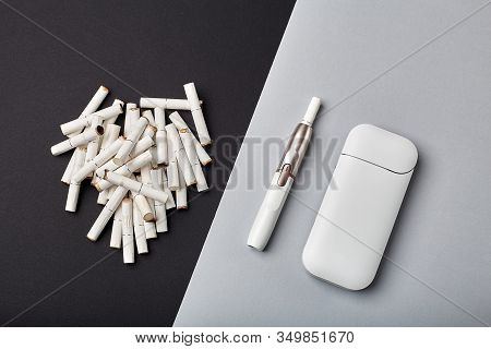 Electronic Cigarette Technology. Tobacco Iqos System. Close-up An Electric Hybrid Cigarette With A H