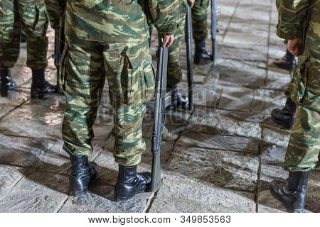 Easter Celebration Night Outside Agios Minas Cathedral. A Marching Band And Military Parade In The O