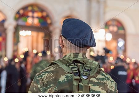 Military Young Man In The Easter Night During Church Service