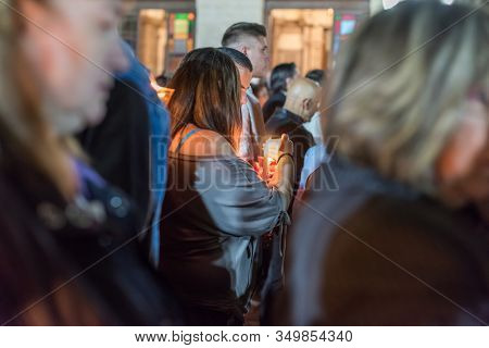 Heraklion, Crete, Greece - 28 April 2019: People Celebration With Lit Candles Easter Night Outside A