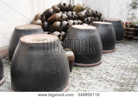 The Empty Xuchang Soy Sauce Clay Jars In Wuzhen Water Town In Zhejiang Province China.