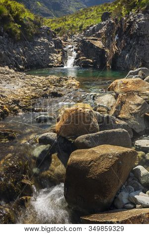 The Fairy Pools, Which Are Cold Swimmable Pools, Multiple Waterfalls, That Vibrant Blue And Green In