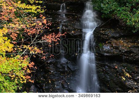 Refreshing Waterfall Hidden Deep In The Autumn Forest