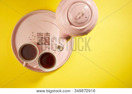 Teapot and cups used in traditional Chinese wedding ceremony with chinese sign meaning happinese. Translation: Double Happiness