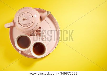 Teapot and cups used in traditional Chinese wedding ceremony with chinese sign meaning happinese. Translation: Double Happiness