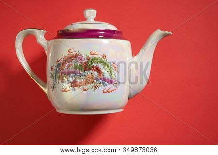 dragon and phoenix Teapot and cups used in traditional Chinese wedding ceremony with chinese sign meaning happinese. Translation: Double Happiness