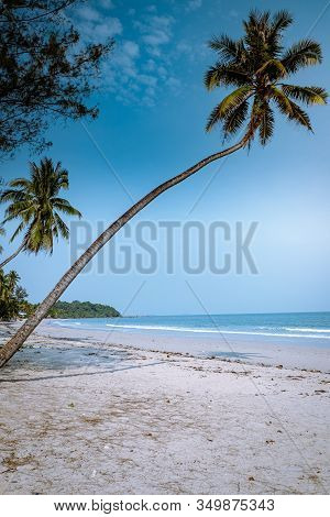 Thung Wua Laen Beach Chumphon Thailand, Couple On The Beach By Palm Tree Hanging On The White Beach