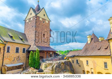 Courtyard Of Medieval Loket Castle (hrad Loket) Gothic Style Building On Massive Rock With Stone Tow