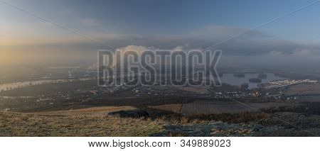 Sunrise Time On Radobyl Hill Over Valley Of River Labe And Lovosice Town
