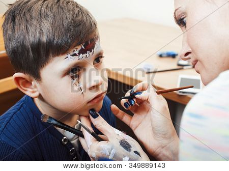 Little Cute Child Making Facepaint On Birthday Party, Zombie Apocalypse Facepainting, Halloween Prep