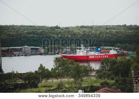07.2016, Vanino, Russia: Red Passenger Ship, Cruising Along The Kholmsk-vanino Route, Parked In Vani