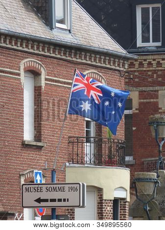 Albert, Somme, France - May 1, 2019. Australian Flag Next To Somme Museum To Commemorate Ww1 Battles