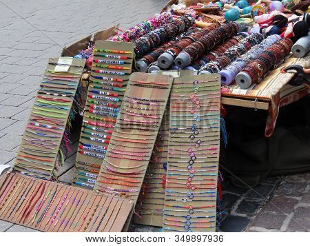 Luxembourg City, Luxembourg - May 23, 2019. Colorful Souvenir Woven Traditional Friendship Bracelets