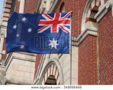 Albert, Somme, France - May 1, 2019. Australian Flag Next To Somme Museum To Commemorate Ww1 Battles